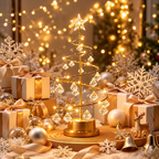 Warm white LED gold crystal Christmas tree lamp with crystal ornaments surrounded by elegant golden Christmas decorations