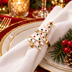 Christmas napkin rings with sparkling gold-tone details styled on a soft ivory napkin for holiday dining.