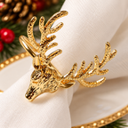 Christmas napkin rings featuring golden reindeer antlers with a polished metallic finish.