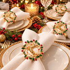 Christmas napkin rings with elegant wreath-inspired decorations styled on ivory napkins for a festive table setting.