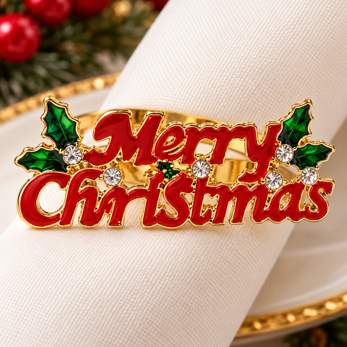 Christmas napkin rings with sparkling gold-tone details styled on a soft ivory napkin for holiday dining.