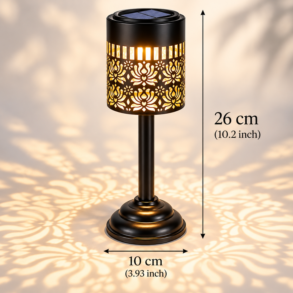 Two solar table lanterns with warm white light and decorative floral patterns on an outdoor patio table