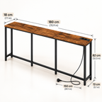 Slim console table with charging station styled behind a sofa with minimalist Scandinavian decor
