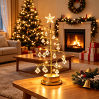 Illuminated gold crystal Christmas tree lamp with crystal ornaments displayed beside a fireplace