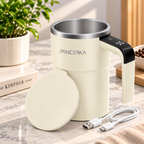 self-stirring coffee mug in cream with lid and USB charging cable in a bright kitchen setting in cream with lid and USB charging cable in a bright kitchen setting