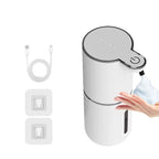 White soap dispenser with power cord and wall outlet adapter on a white background