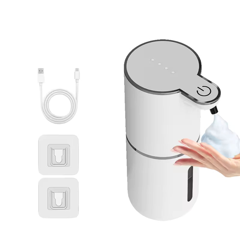 White soap dispenser with power cord and wall outlet adapter on a white background